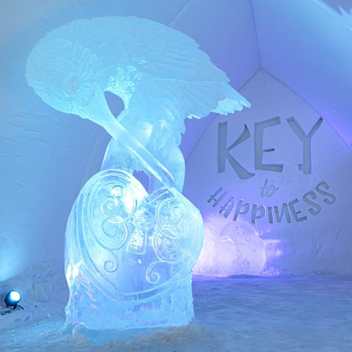 Ice sculpture of winged figure with heart