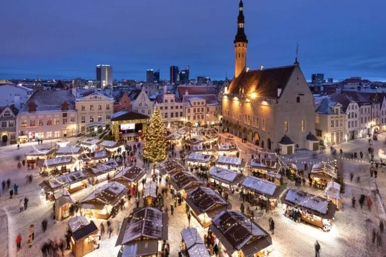 Snowy Christmas market in European town square
