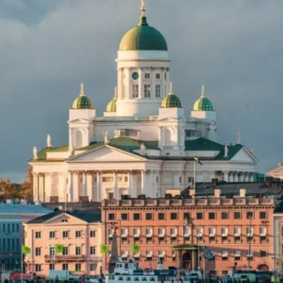 Helsinki Cathedral with green domes at sunset